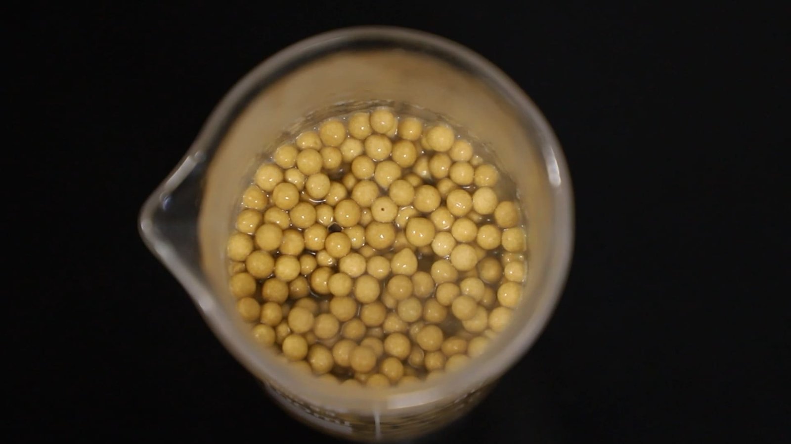 An industrial setup with pipes and valves, representing a regeneration system.