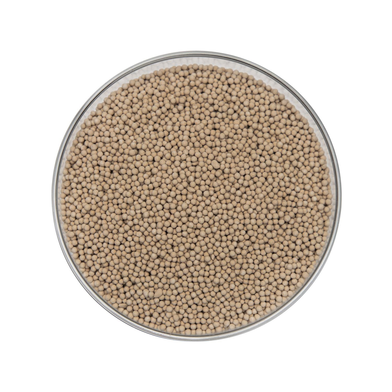 A control panel with a finger pointing to the standby button, with safety locks on valves in the background.