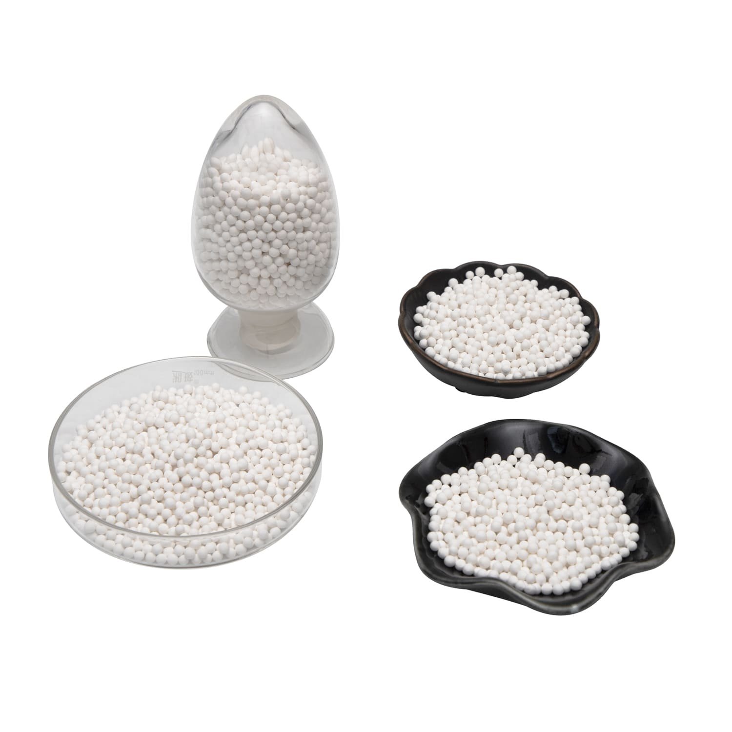 Close-up of clean desiccant beads versus dark, oil-fouled desiccant beads.