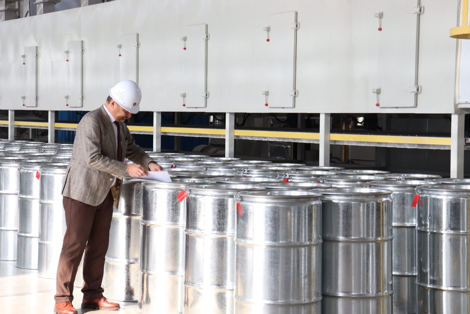 A compressed air dryer integrated into an industrial system